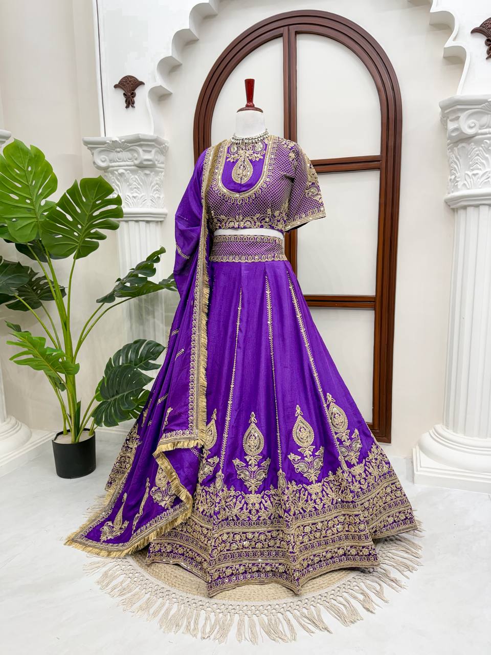 Royal Amethyst Purple Silk Lehenga Choli with Majestic Gold Zari Heritage Motifs and Elaborate Borders